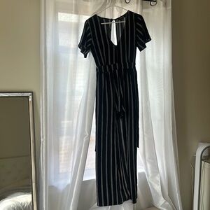 Striped romper with attached skirt. Size 5 women’s